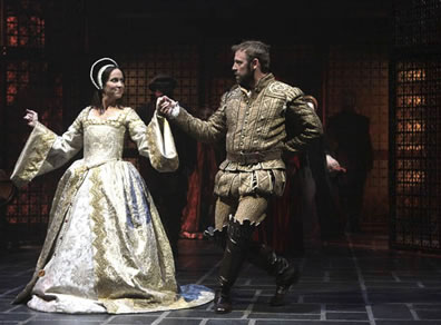 Anne and Henry holding hands in a dance